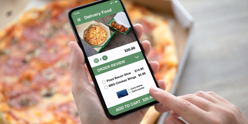 person using online food delivery app